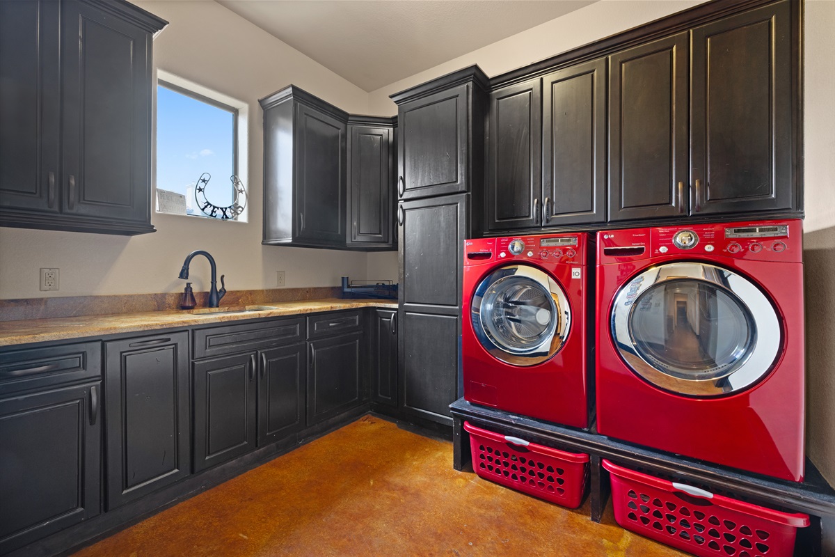 "Laundry day just got an upgrade! 🧺✨ This spacious laundry room offers plenty of counter space, ample storage, and modern appliances to make everyday tasks a breeze."