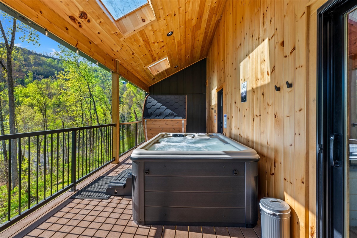 Large, covered deck with string lights