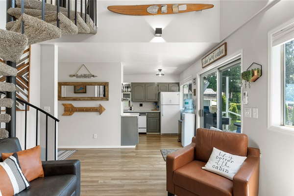 In the living room looking toward the kitchen, main level.