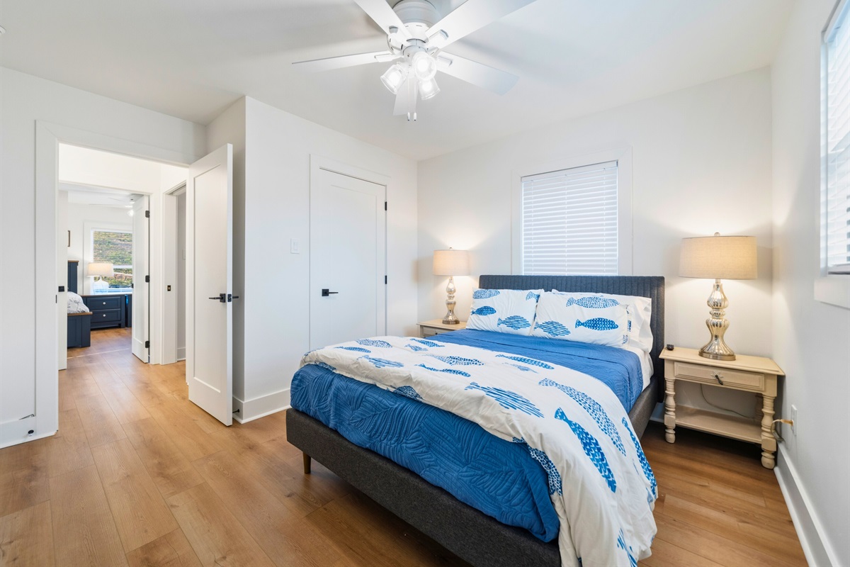Natural light fills this bedroom, creating a bright and comfortable place to relax and recharge.