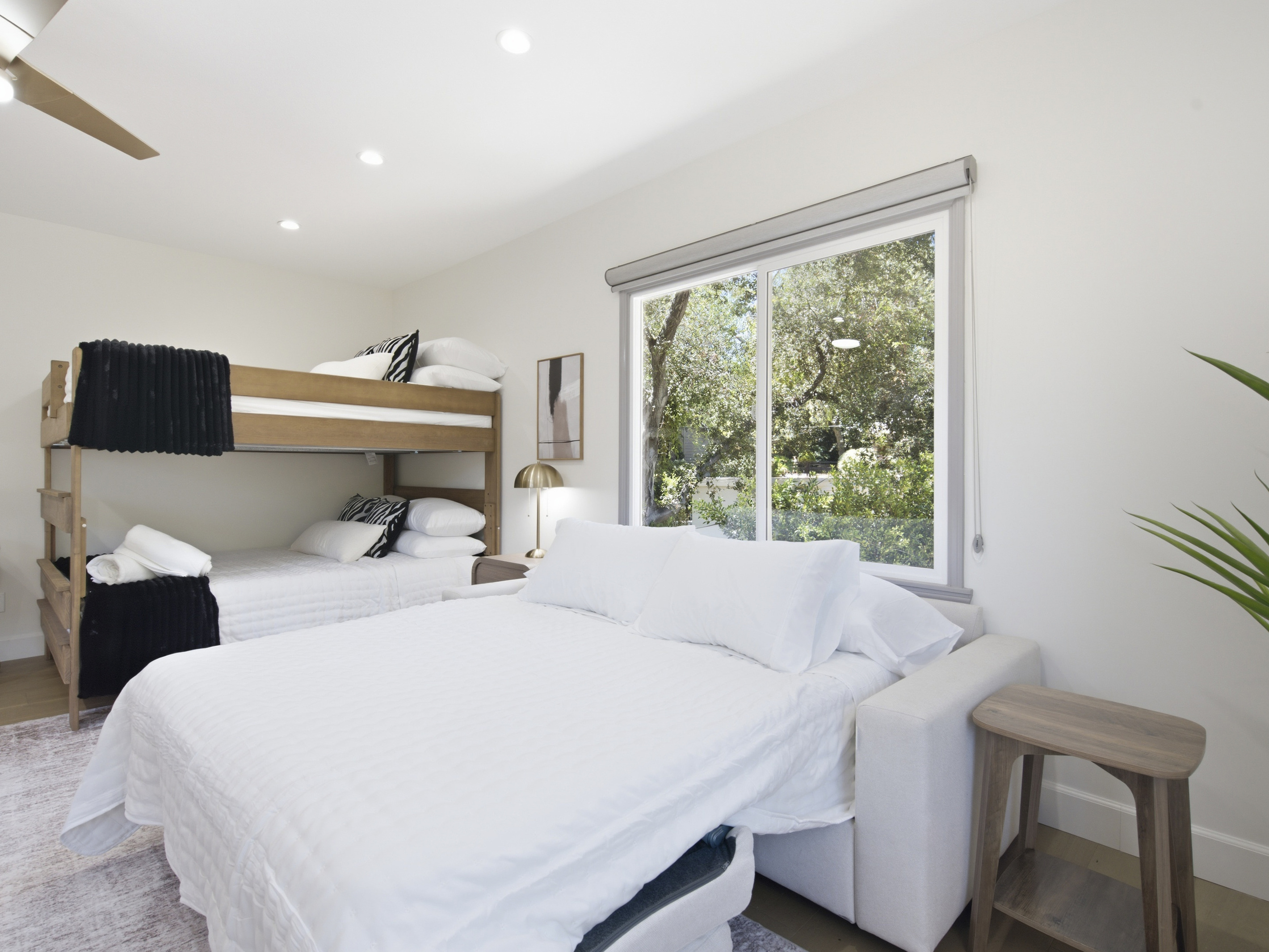 Relax, recharge, and enjoy a peaceful stay in this beautifully appointed bedroom.