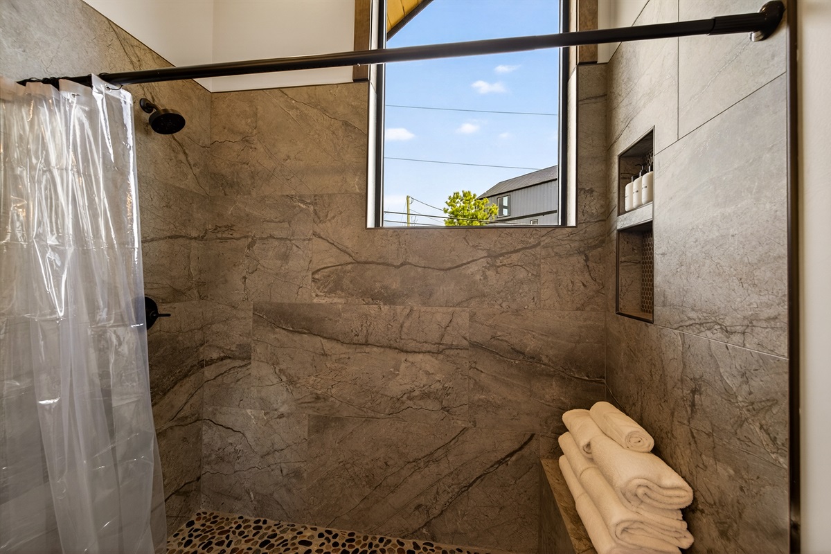 This is the bathroom en-suite to the two queen over queen bunks. Soak up the sun with this extra large window.