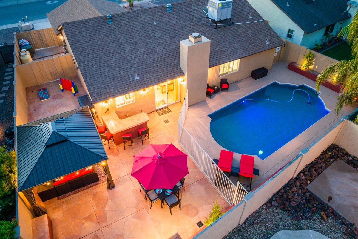Fun and private backyard with heated pool.