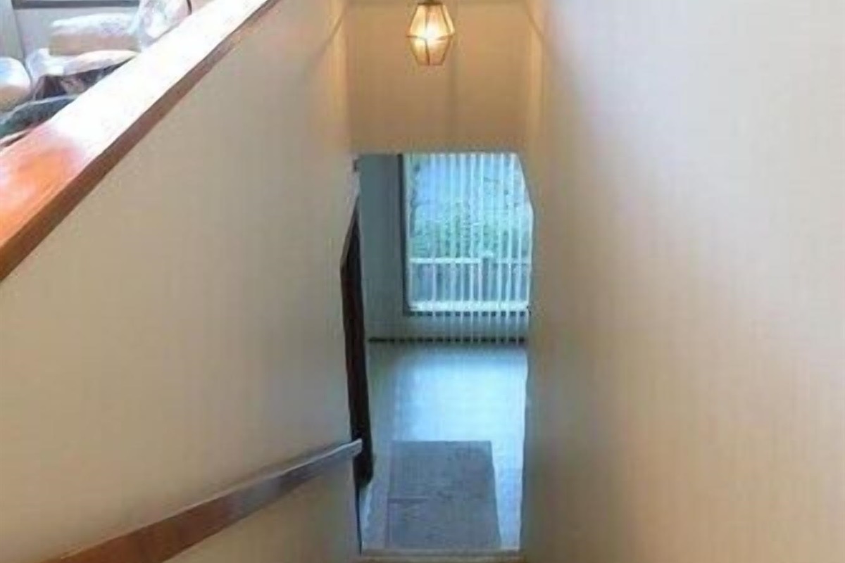 stairway from entryway to Living room on 2nd floor