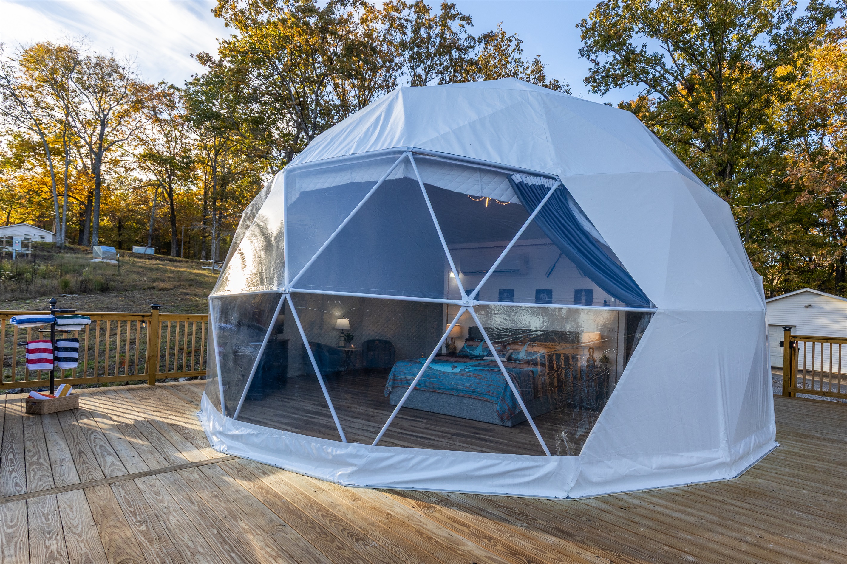 Unique luxury geodesic dome with a panoramic clear wall—sleep under the stars while enjoying full privacy and modern comfort