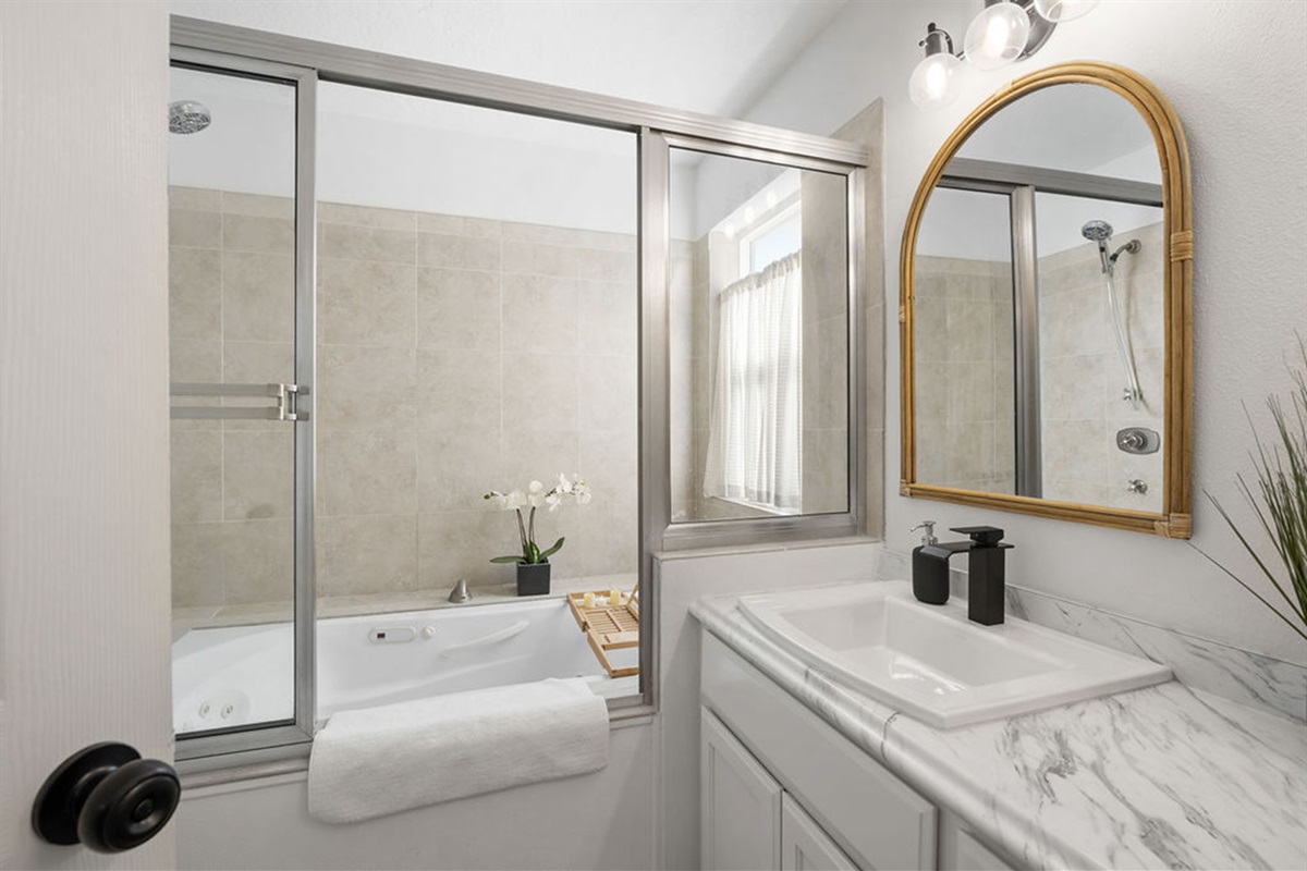 Bathroom # 1 is attacted to Primary Bedroom #1 and has a built in 6ft jacuzzi hot tub.