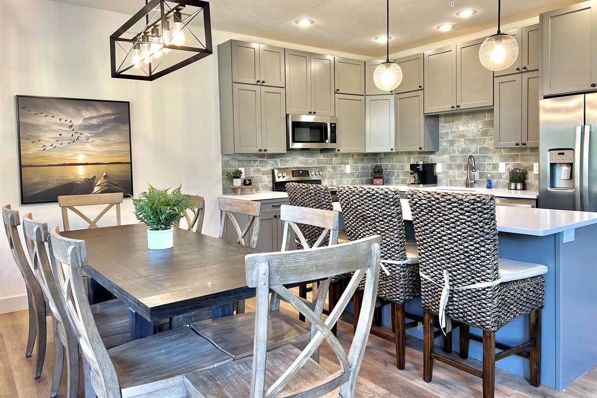 Dining and kitchen spaces with extra bar seating