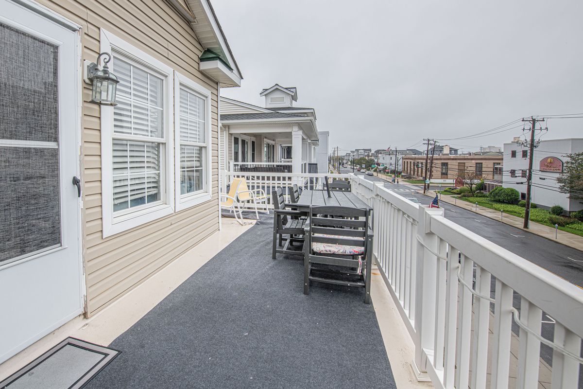 Outdoor Balcony with Dining Table and Street View