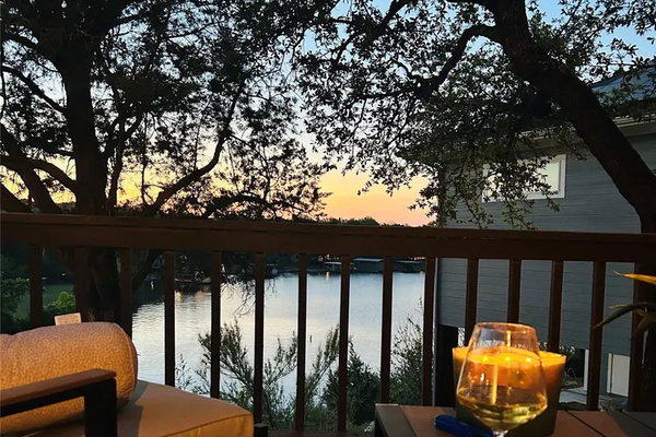 Evening deck seating overlooking the water.