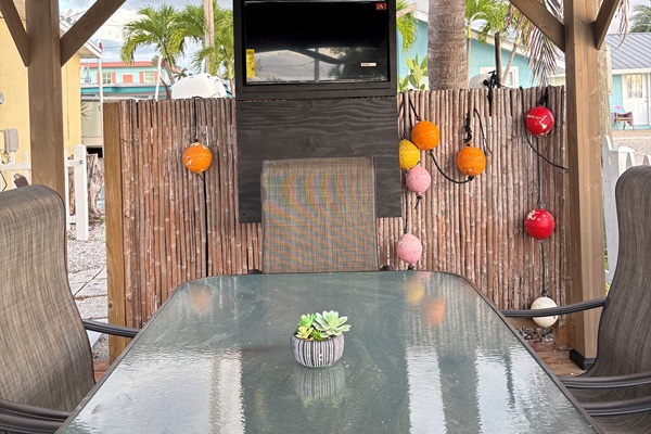 Sit in the gazebo while being torn between watching the dolphins, or watching television