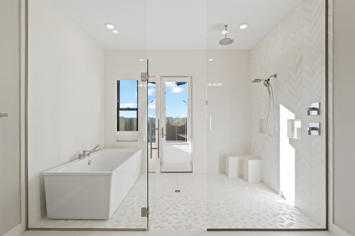 High-end master ensuite with a limestone spa-bath.  a