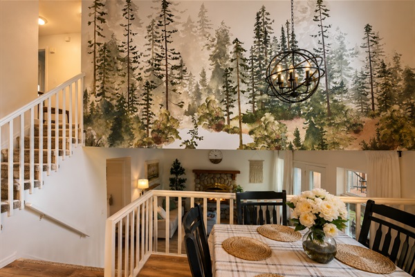 Whispering Pines mural adorns the kitchen gathering area. 