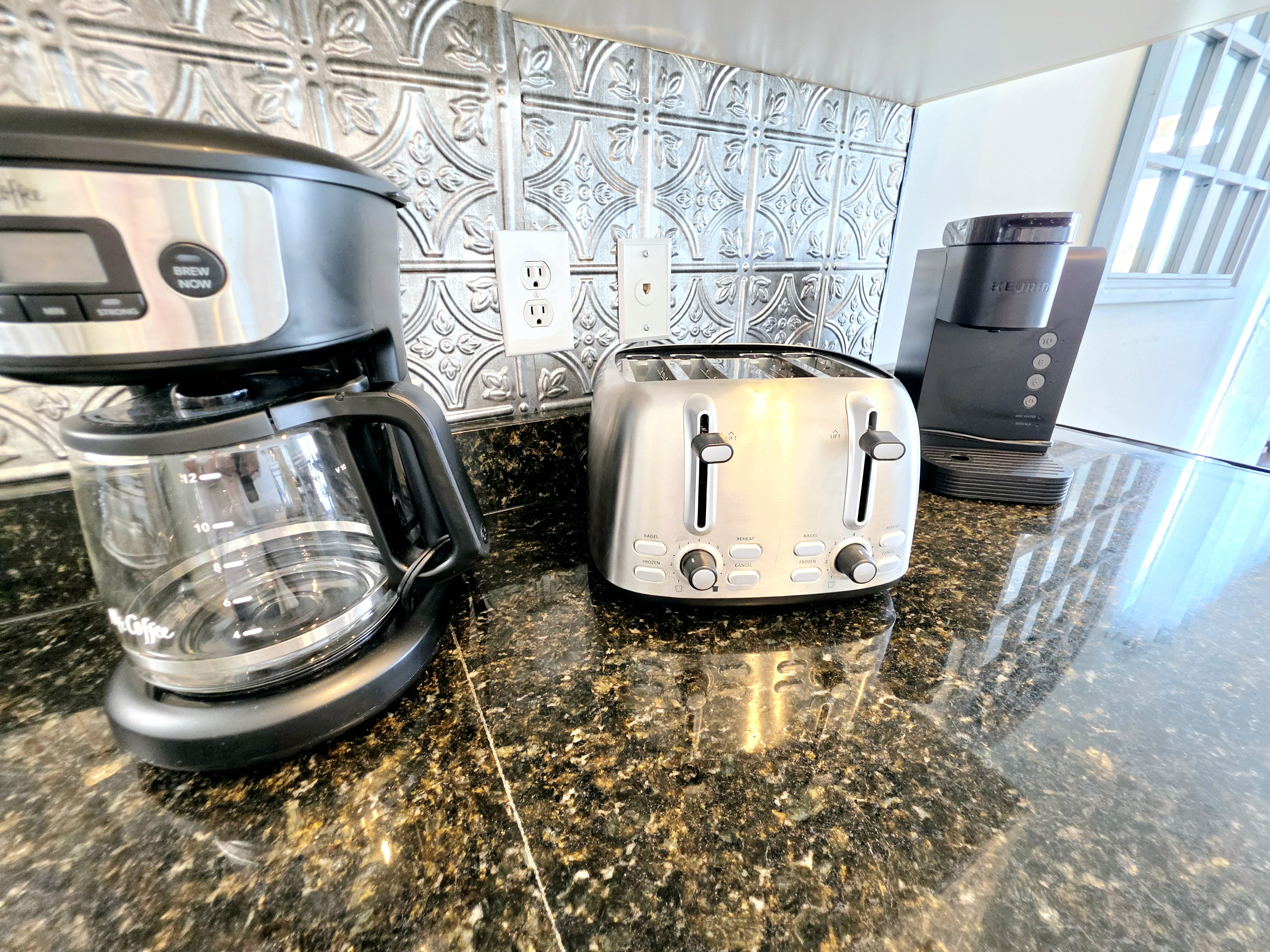 Toaster and coffee maker on the kitchen counter