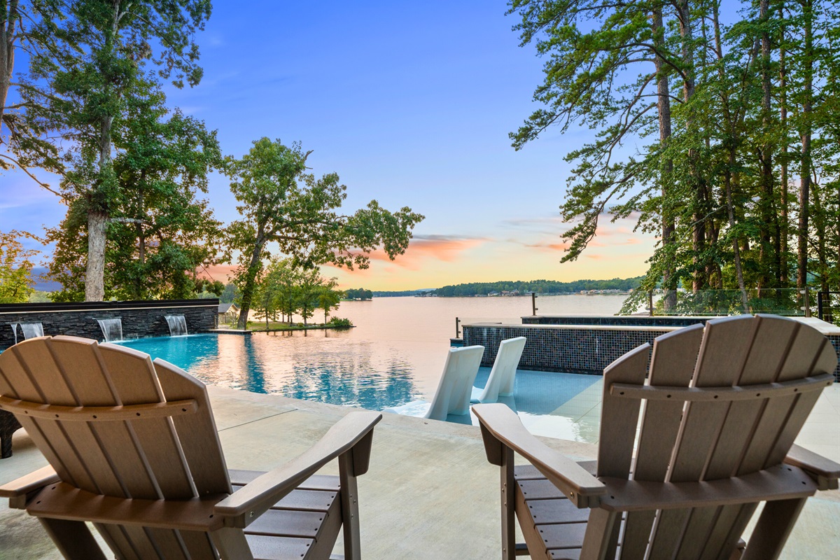 Relax poolside in Adirondack chairs with the water stretching out before you.