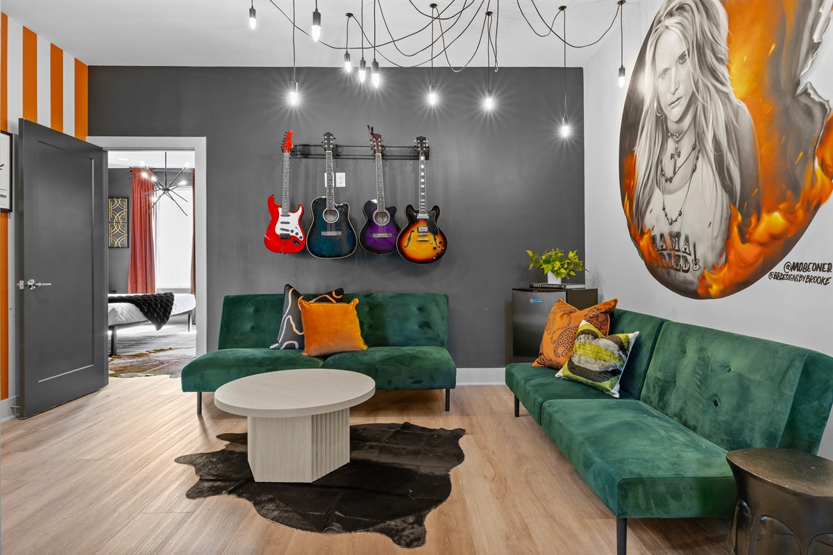 Chic Lounge: Dive into vibrant Nashville vibes with electric decor and a rockin' atmosphere!