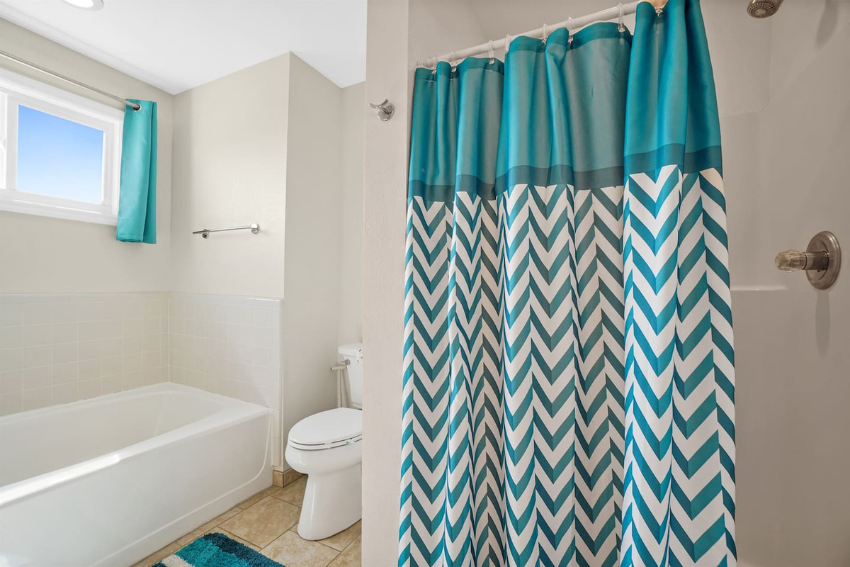 Take your pick: a long soak in the tub or a hot shower &mdash; the master bath gives you both.