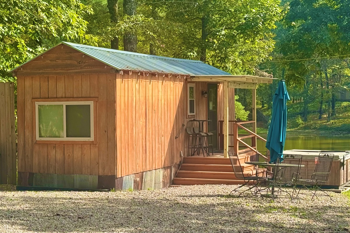 Covered front porch with lake view