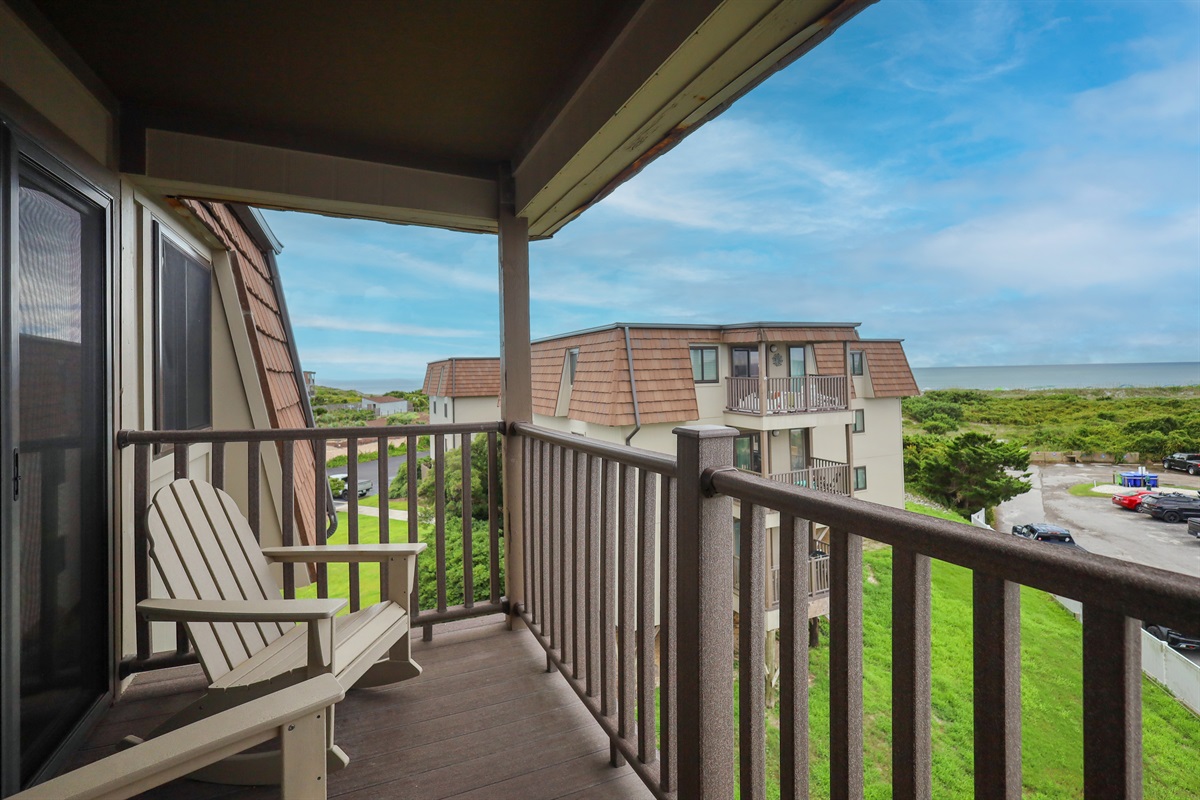 Enjoy serene neighborhood views from the balcony