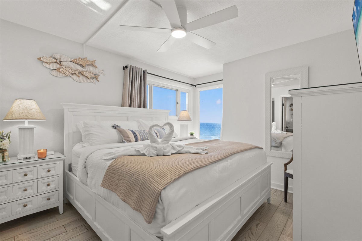 Primary suite featuring a luxurious king bed and a private ensuite bath—your own tranquil retreat to unwind in total comfort after a day on the beach.