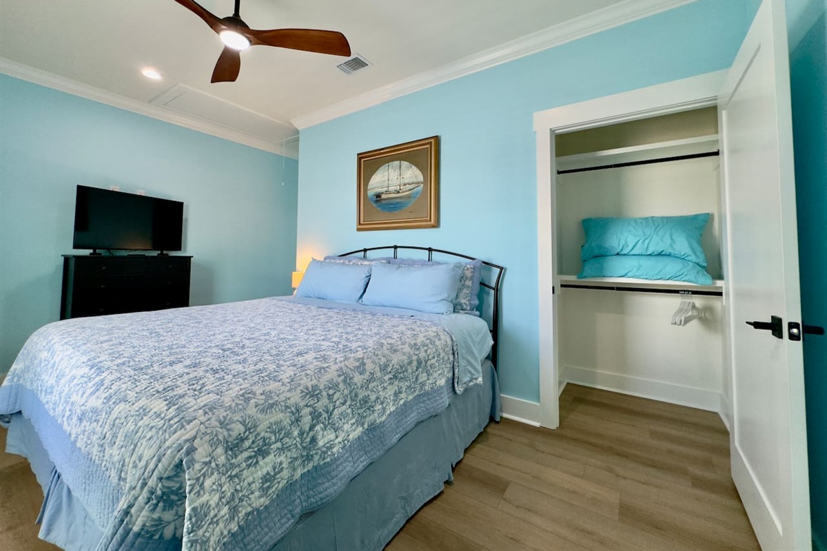 Unwind in a soft, coastal room with gentle natural light.