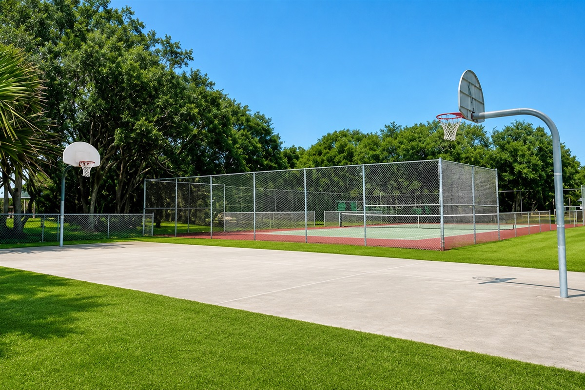 Basketball Courts with dog park just behind it 