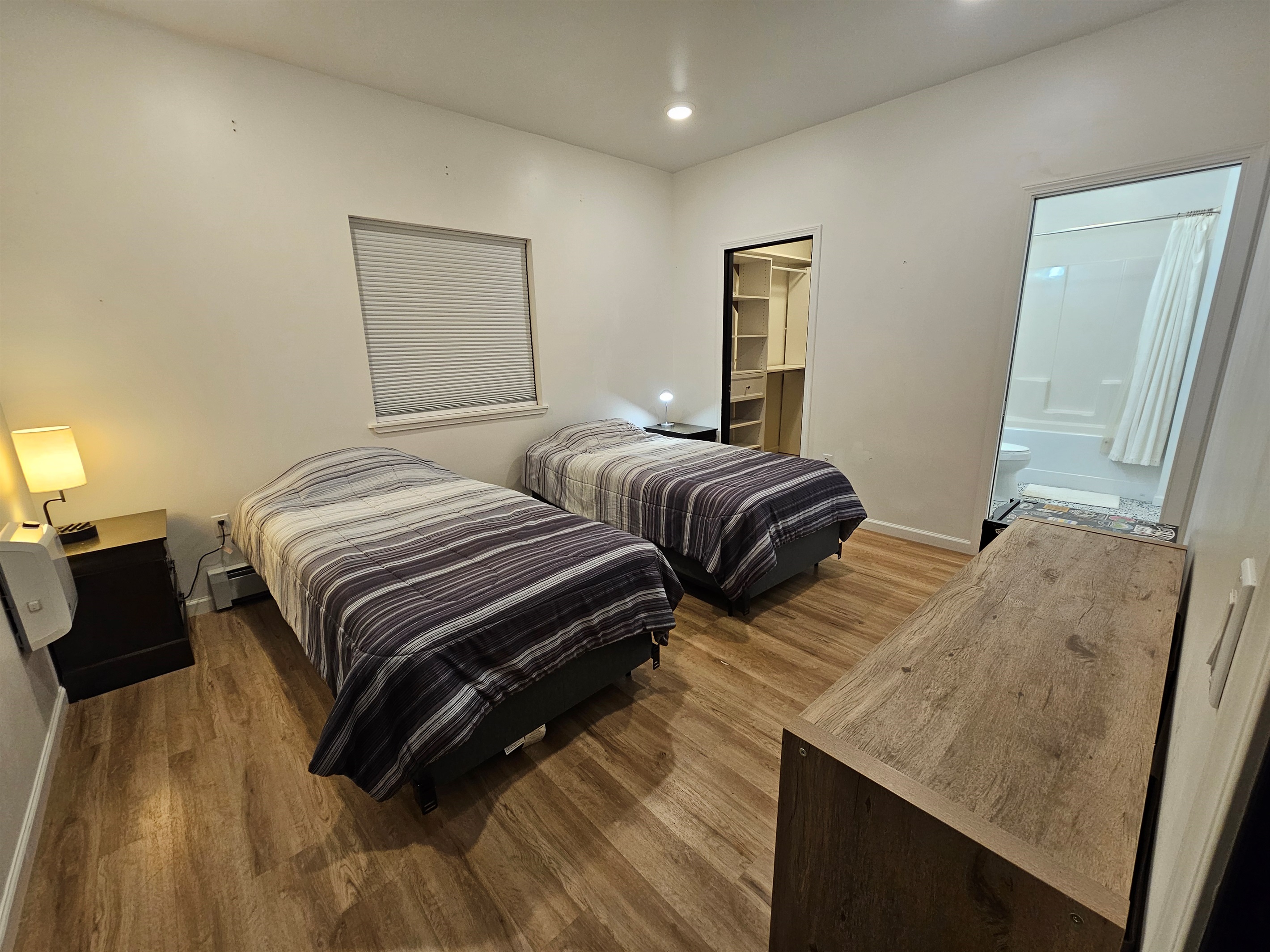 Bedroom 1 with 2 beds and Connected to Bathroom