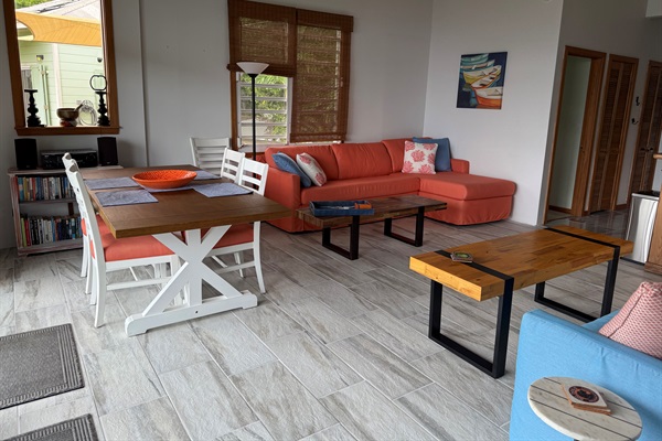 Open Living dining area with updated tile floors.