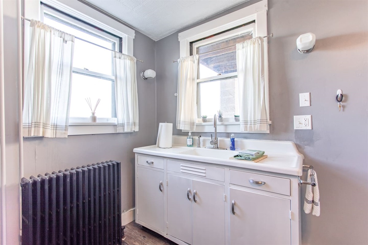 Spacious kitchen sink, perfect for meal prep and easy cleanup during your stay.