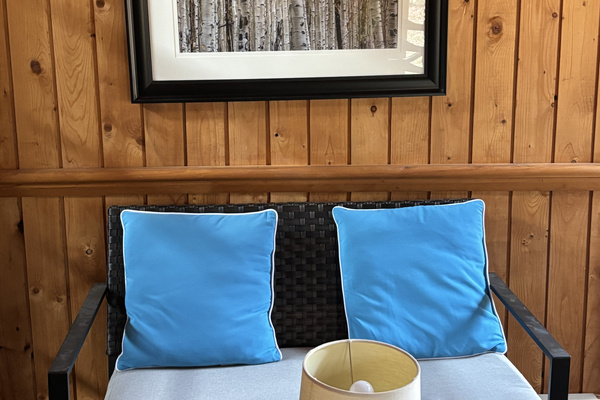 Love seat in cottage entry area