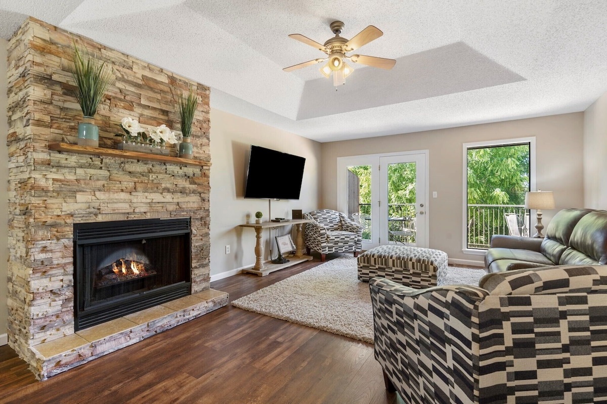 Unwind in style&mdash;modern HD entertainment and a crackling fire await.