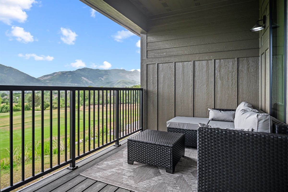 Take in sweeping views of the mountains and golf course from the comfort of your private deck.