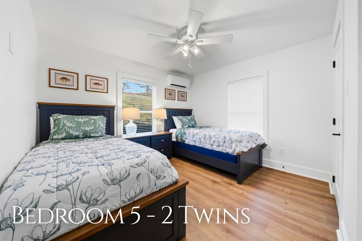 Two twin beds provide a flexible sleeping arrangement that works well for kids, friends, or additional guests.