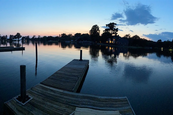 Our peaceful dock at dusk - all that is missing is you and your favorite beverage!