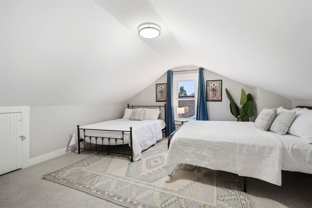 You’ll love the Double Queen Bedroom on the third floor under the eaves with its two queen beds.