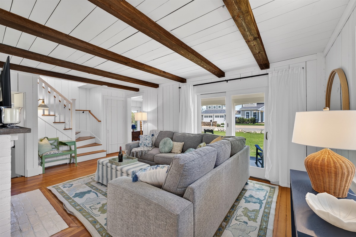 Inviting living room with a simple, cozy setup that encourages relaxation and easy conversation.