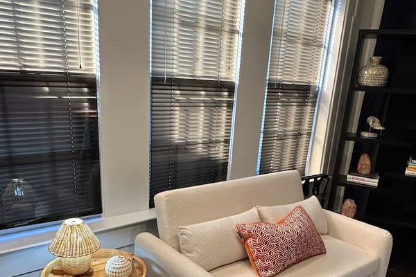 Sitting area with pull out futon in the Boho Room. Lots of natural light. 