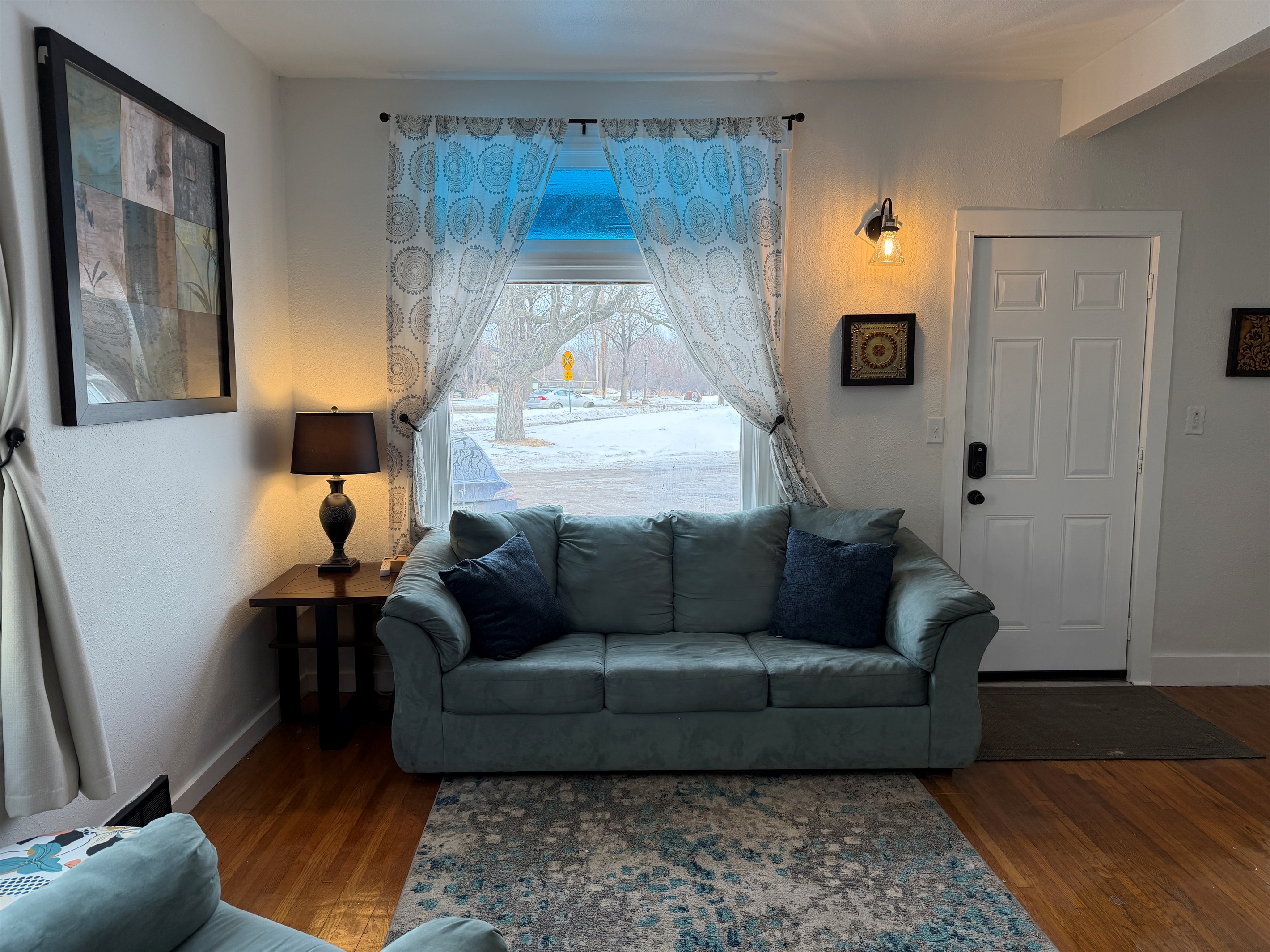 The cozy, comfy large couch accents the living room.