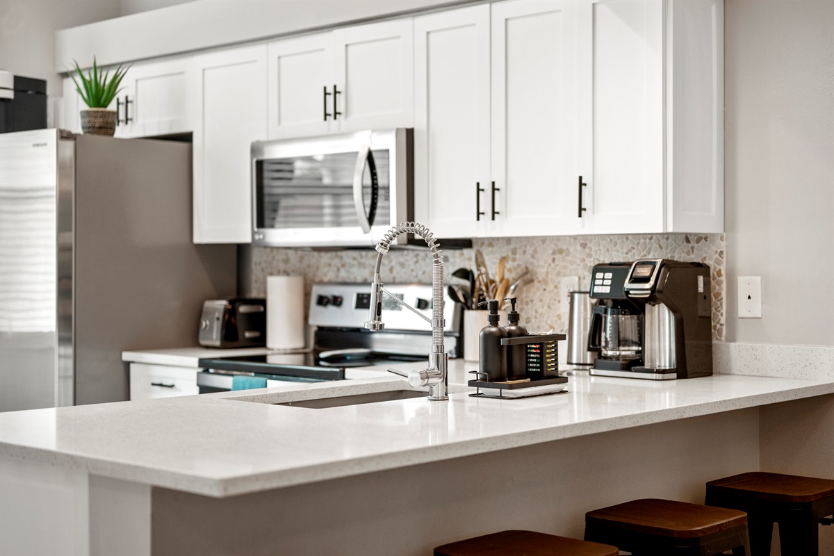 Fully stocked kitchen with modern appliances and all the essentials