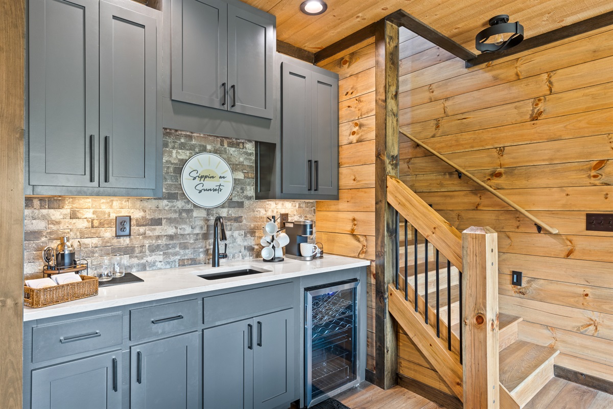 Where mornings begin and evenings sparkle. Wet bar, cava for wine and coffee maker.