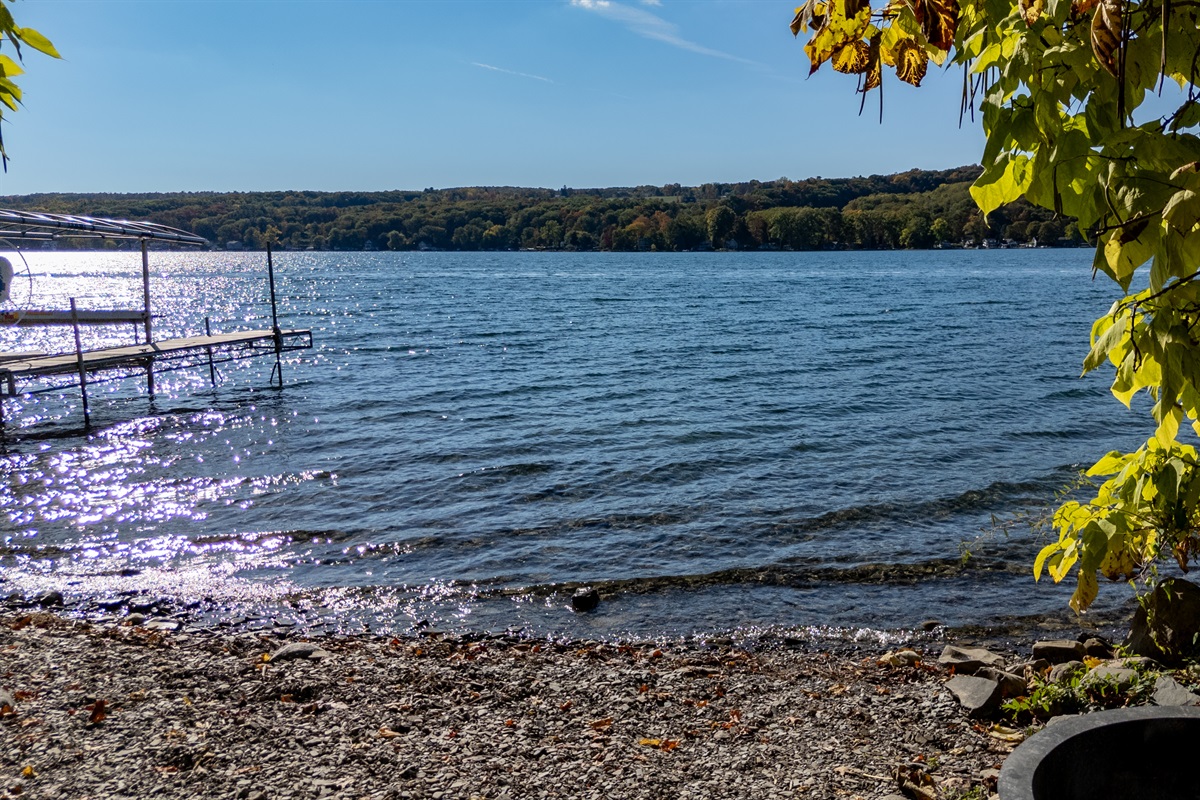 Shoreline shot looking across lake — water, sky, and color.