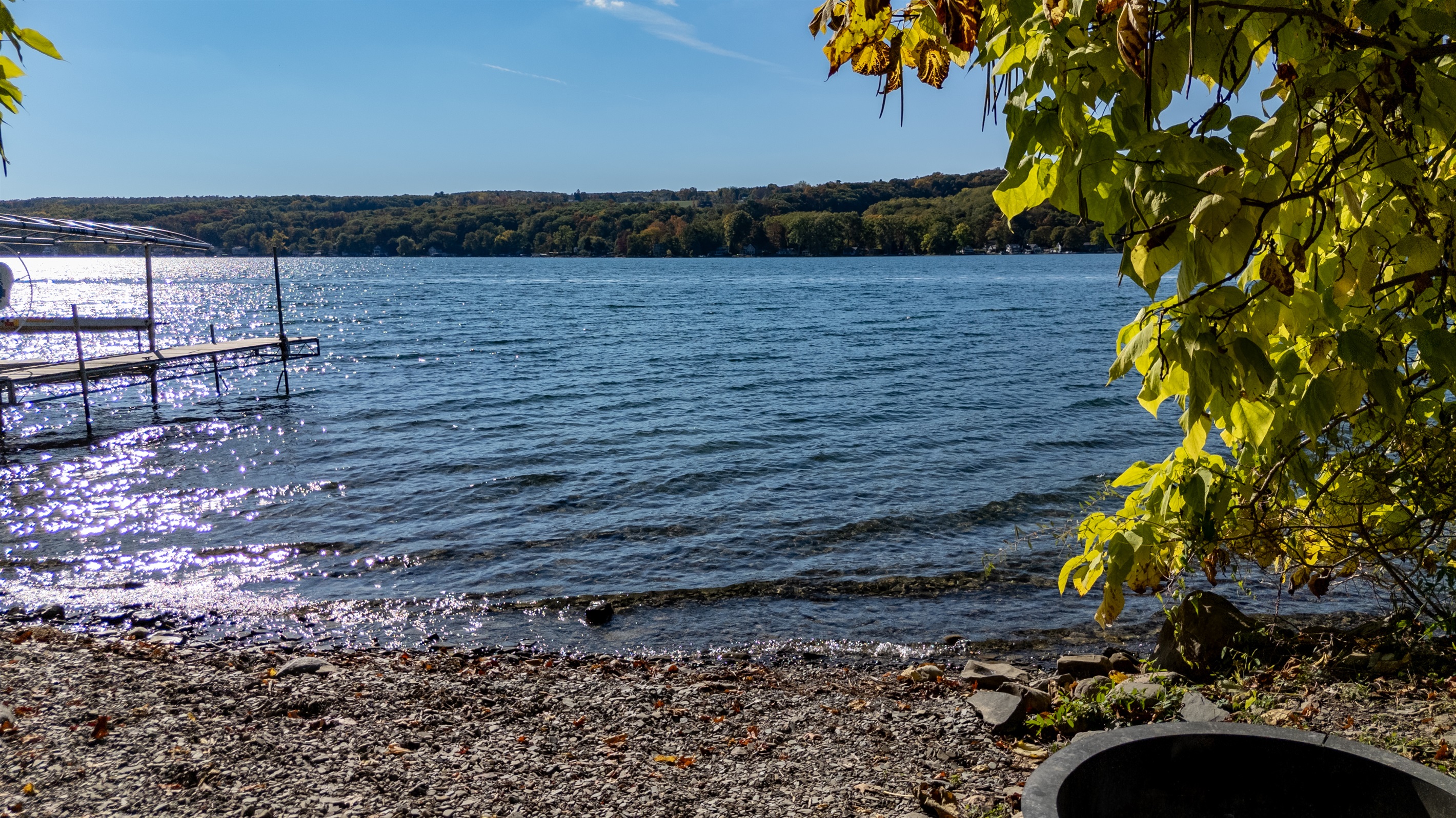Shoreline shot looking across lake — water, sky, and color.