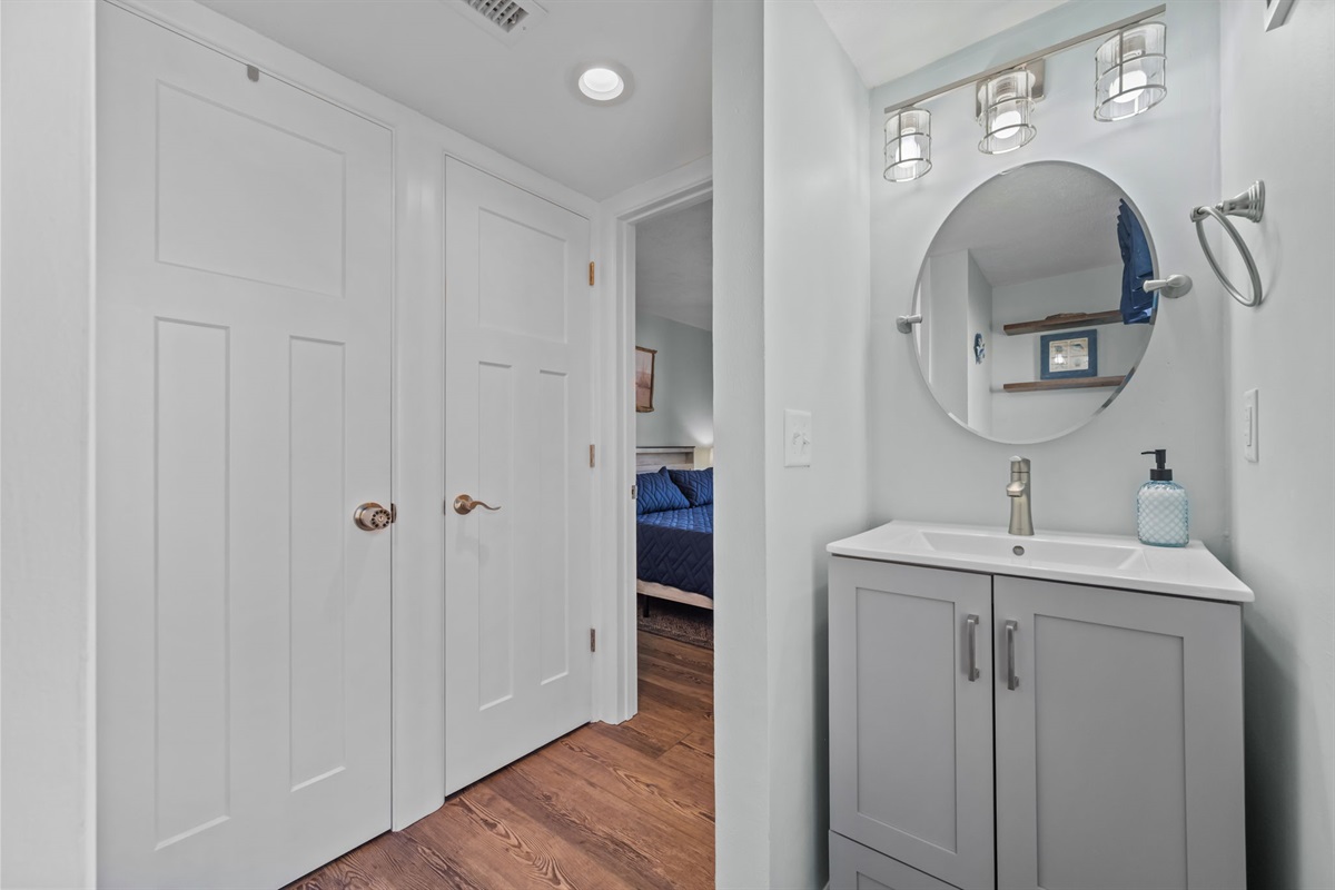 Clean and modern bathroom with a sleek vanity and bright lighting