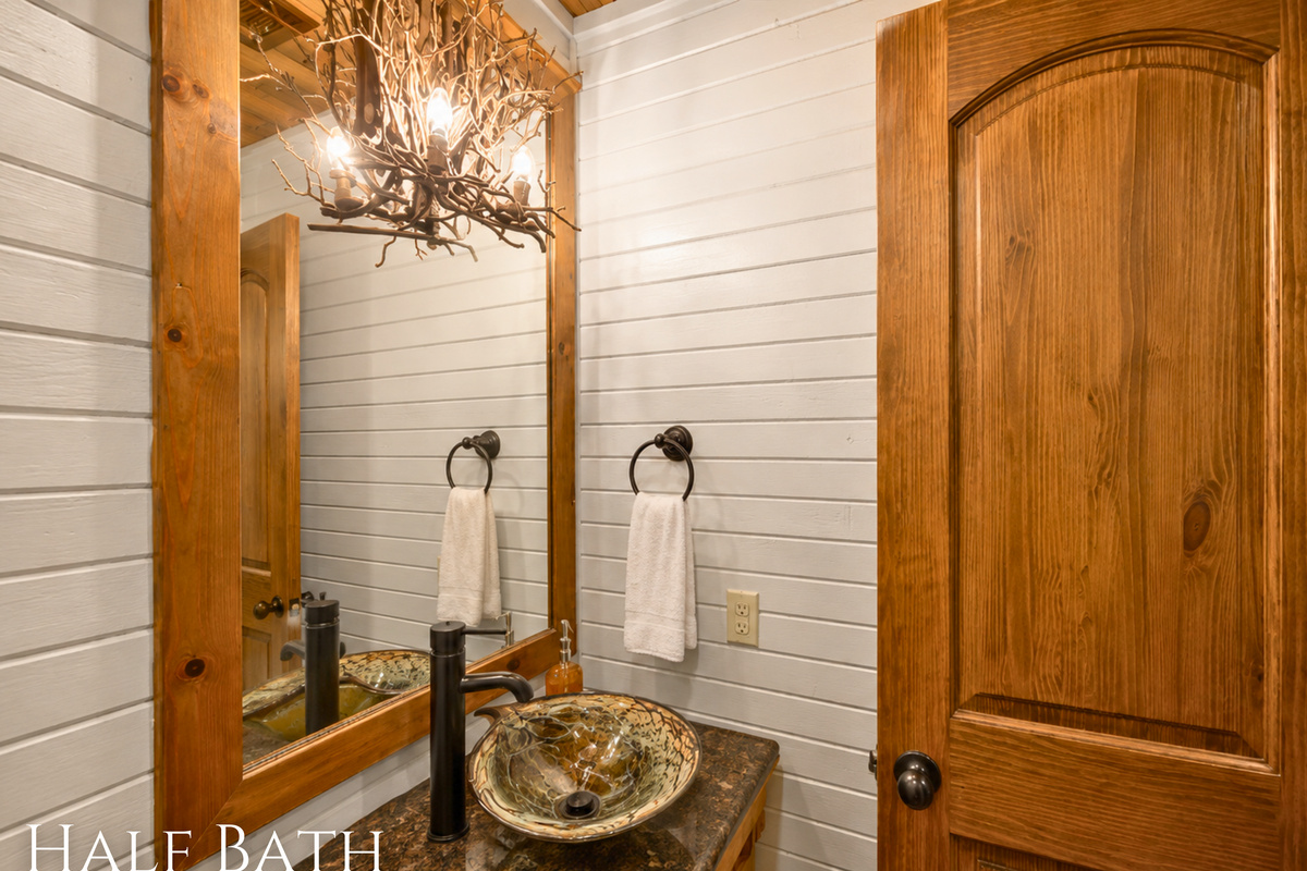 A convenient half bath adds a little extra flexibility to the main living areas and makes it easy for everyone to spread out during the stay.