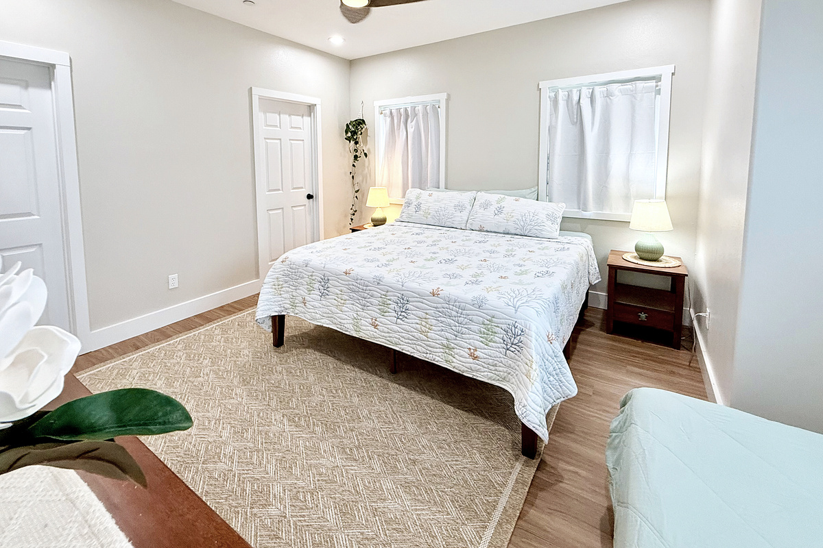 King + Twin Bed | Representative Interior. Finishes, decor, and furniture, vary by unit.