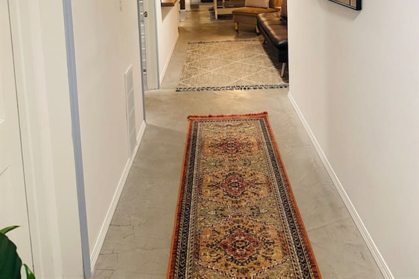 Hallway leading through the spacious interior of the home.