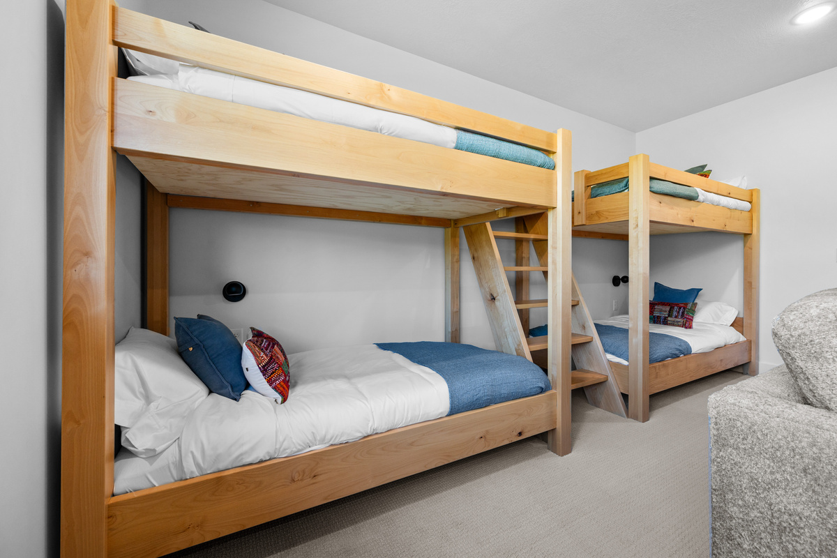 Custom bunk beds maximize comfort and sleeping capacity.