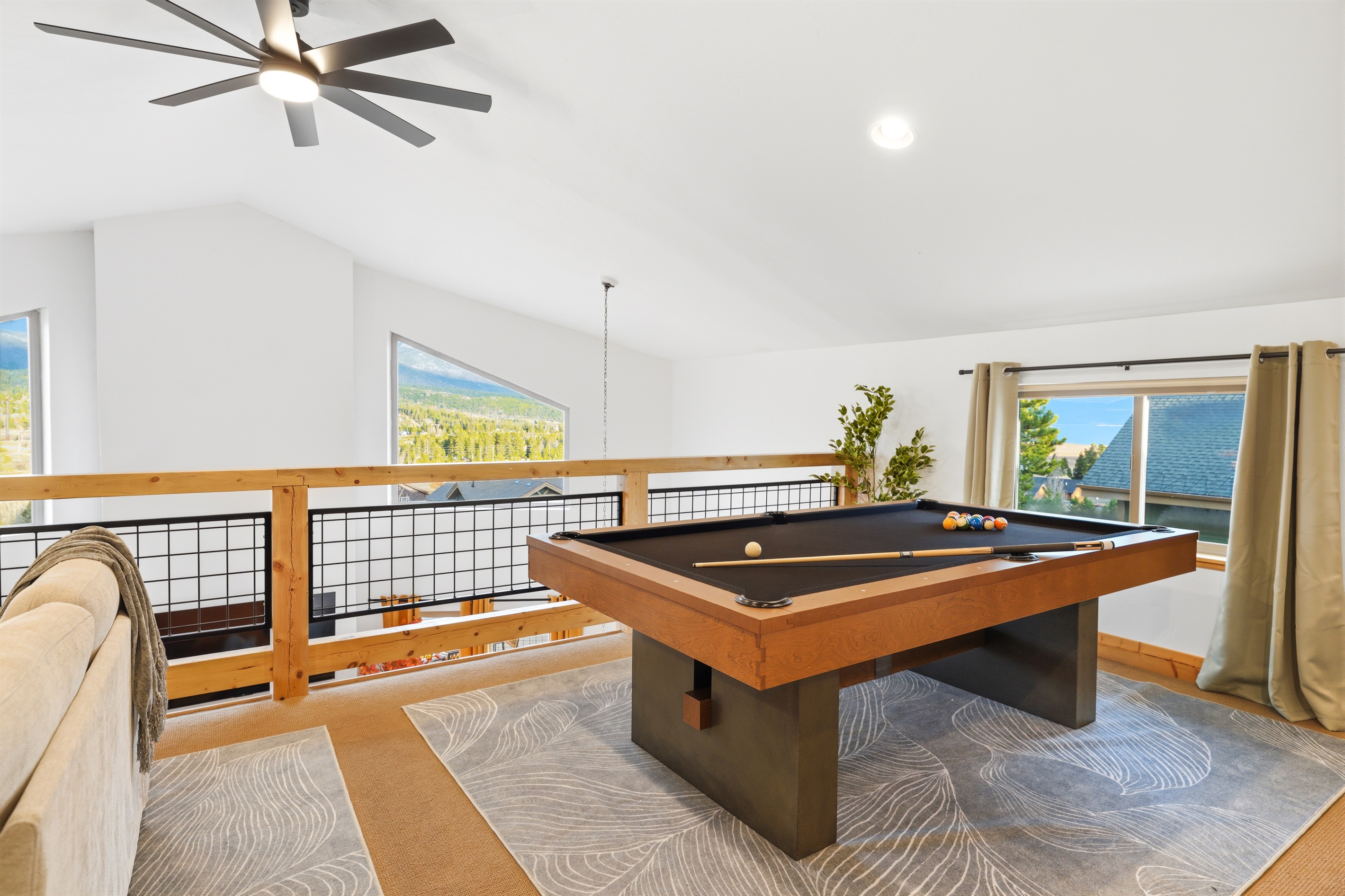 Tucked just above the main living space, the loft invites you in with its cozy, relaxed atmosphere.