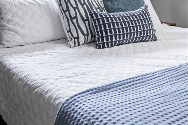 Sleep comfortably in a king size memory foam bed and blackout curtains. Watch your favorite shows and movies on the smart TV.