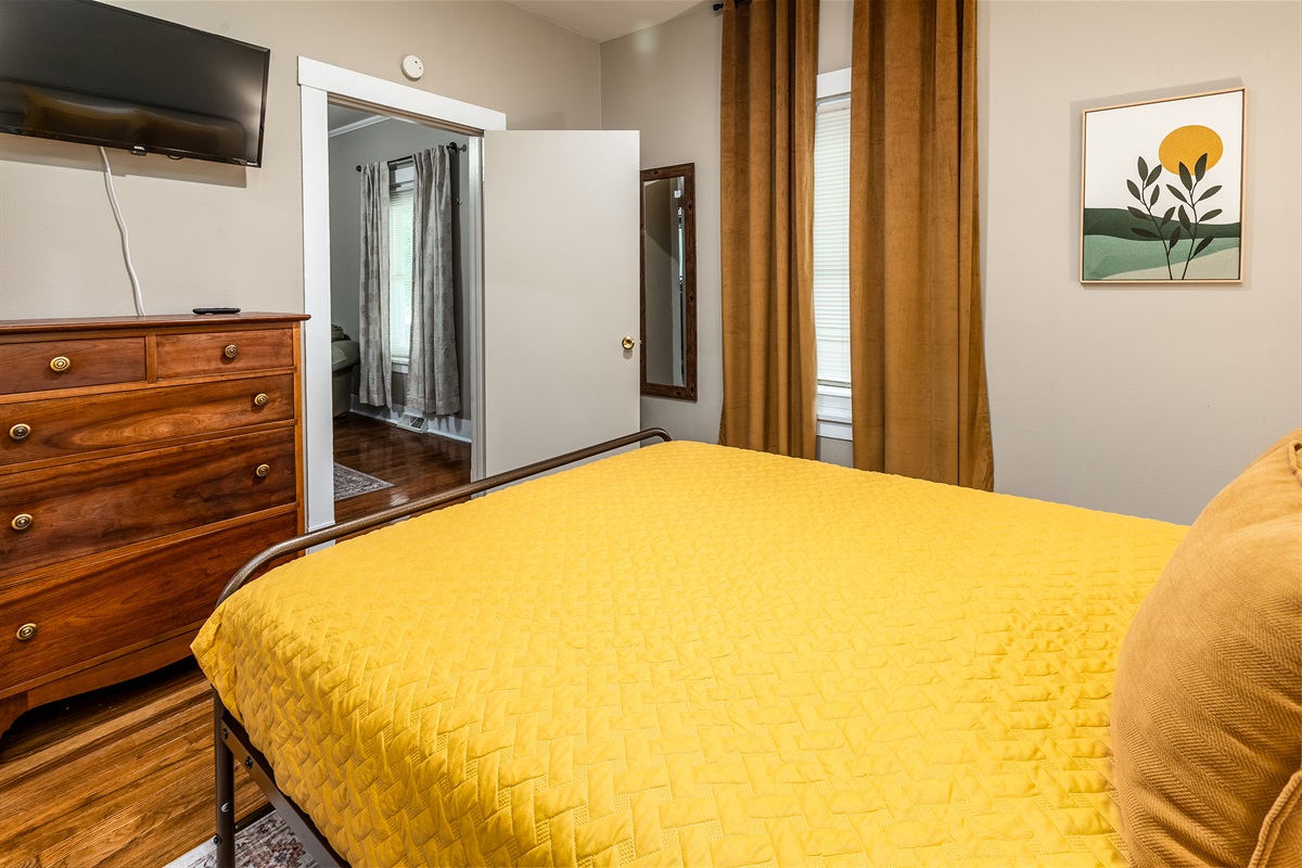 TV and Dresser in Bedroom 1