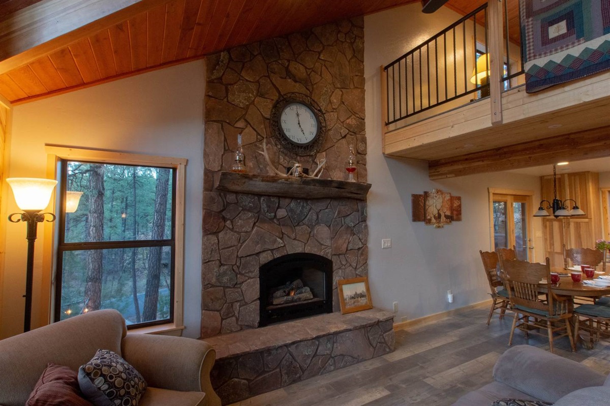 Beautiful Mossy Rock gas fireplace with natural mantel